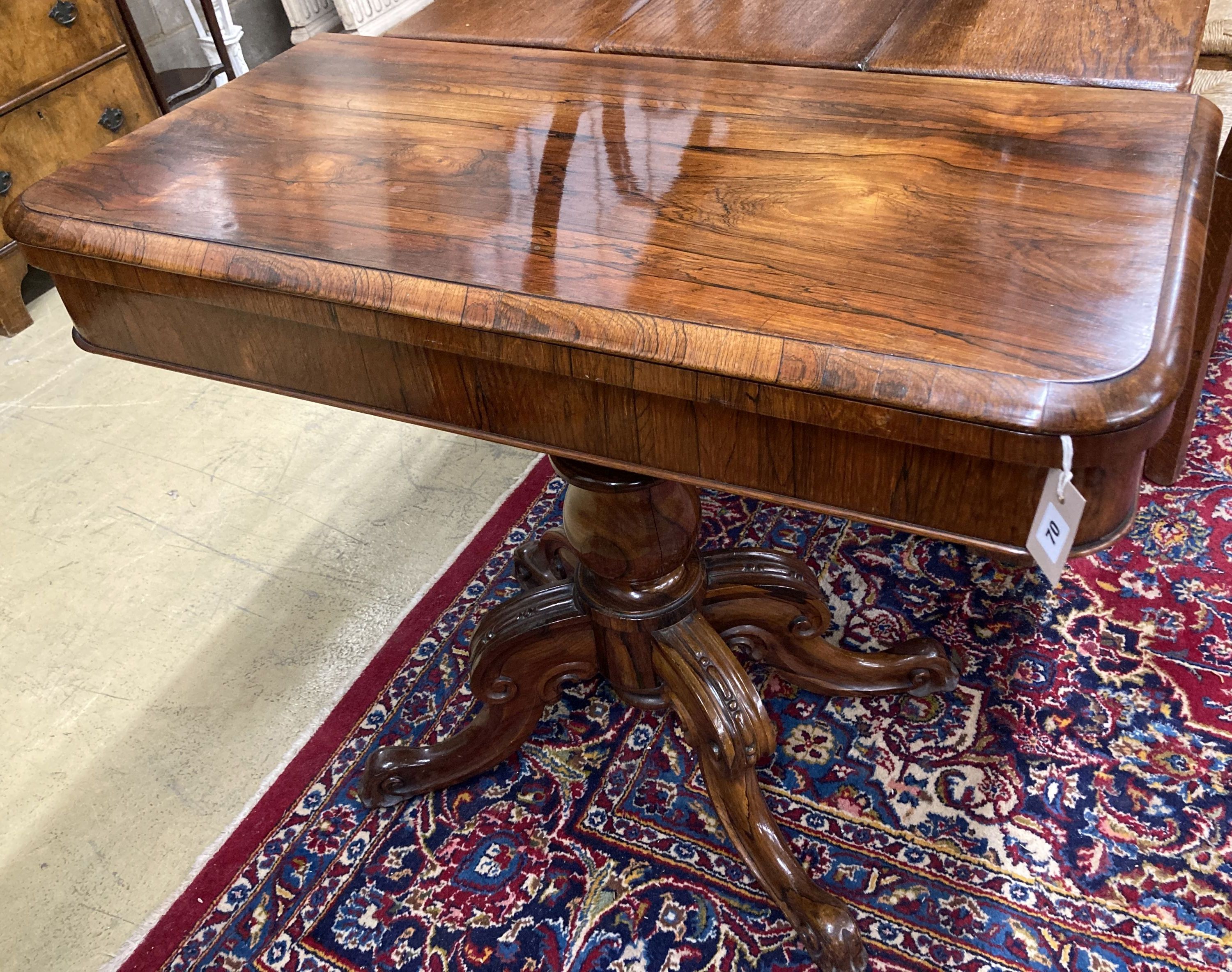 A mid Victorian rectangular rosewood folding tea table, width 92cm, depth 46cm, height 78cm